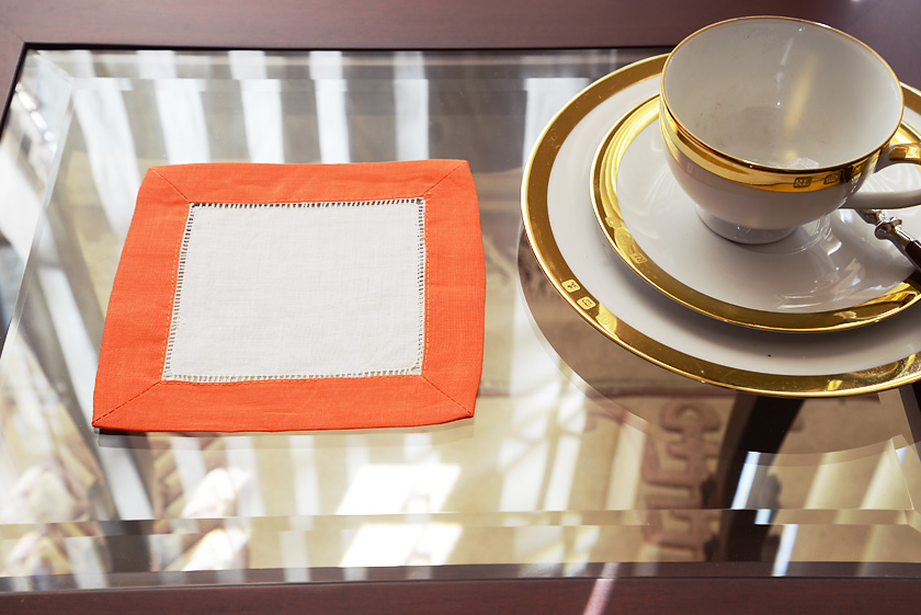 hemstitch cocktail napkin, color on color, hot orange border