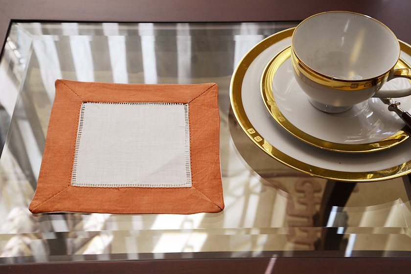 hemstitch cocktail napkin, color on color, peach caramel border